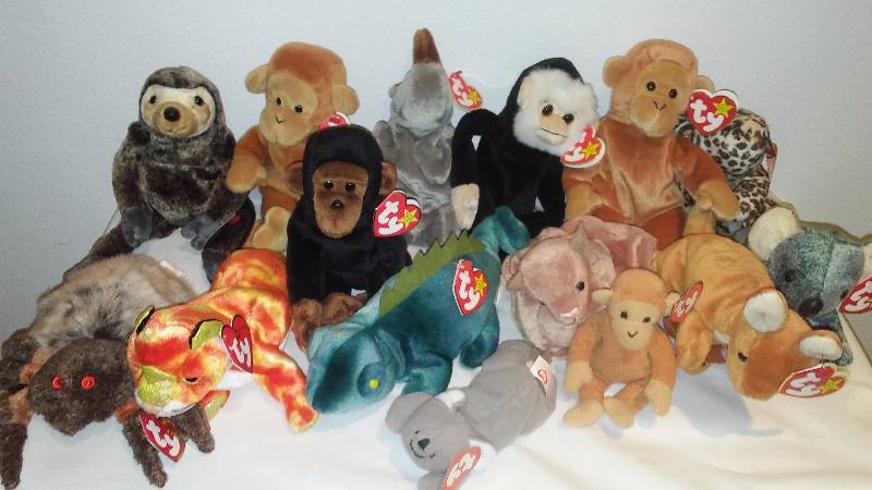 lot 143 image: Safari Beanie Baby Collection (15) Displayed only, never played with, Heart Tags, All with Tush Tags