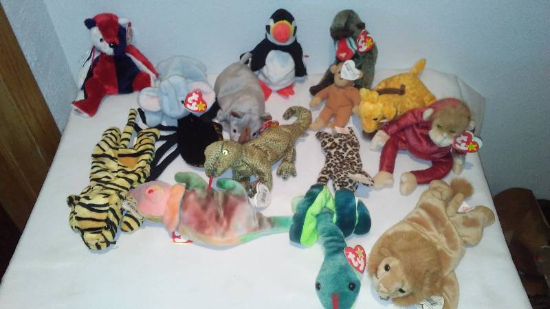 lot 144 image: Safari Beanie Baby Collection (15) Displayed only, never played with, Heart Tags, All with Tush Tags