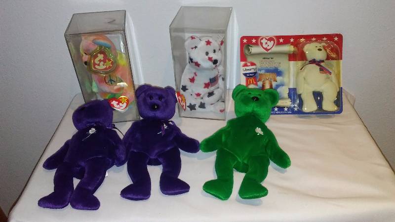 lot 148 image: Beanie Baby Collection (5) Displayed only, never played with, Heart Tags, All with Tush Tags Erin Bear does not have heart  swing Tag, Princess (2) and Peace Bear