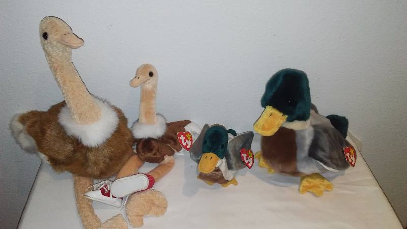 lot 242 image: Stretch and Jake Mother and Baby Beanie Baby Collection (4) Displayed only, never played with, Heart Tags, All with Tush Tags