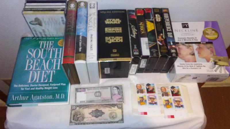 lot 158 image: Lot of Cds, VHS and Stamps Bolivia & Philipine vintage currency