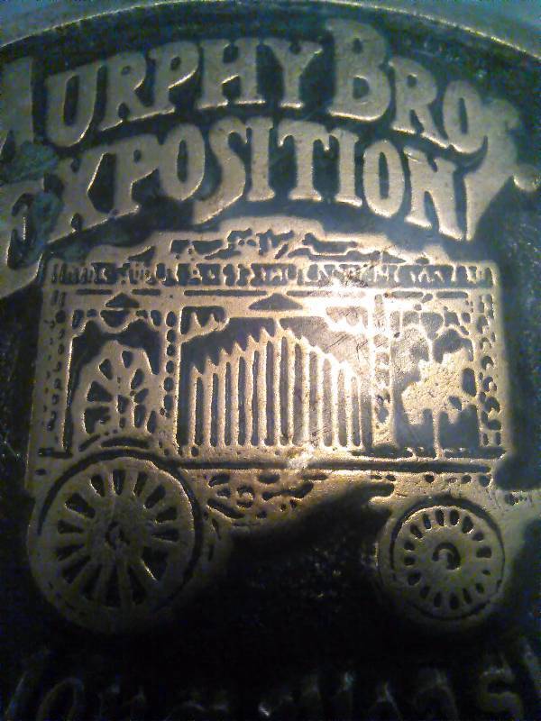lot 276 image: Vintage Belt Buckle, Murphy Brothers Exposition, the mile-long pleasure trail, Bostock Buckle Sealed