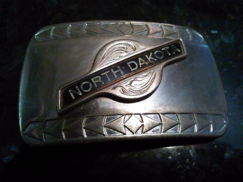 lot 288 image: Vintage Belt Buckle, North Dakota Silver Colored