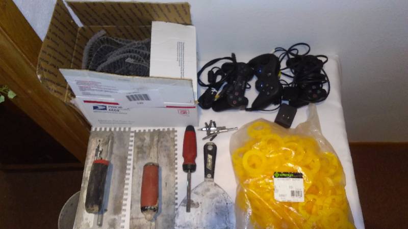 lot 205 image: Misc. Electronic Lot, Game Controllers, AutoFeed Drywall Screws, GreenLee Stud Protectors