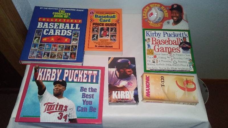 lot 207 image: Kirby Puckett Books, Tapes and baseball Price Guides