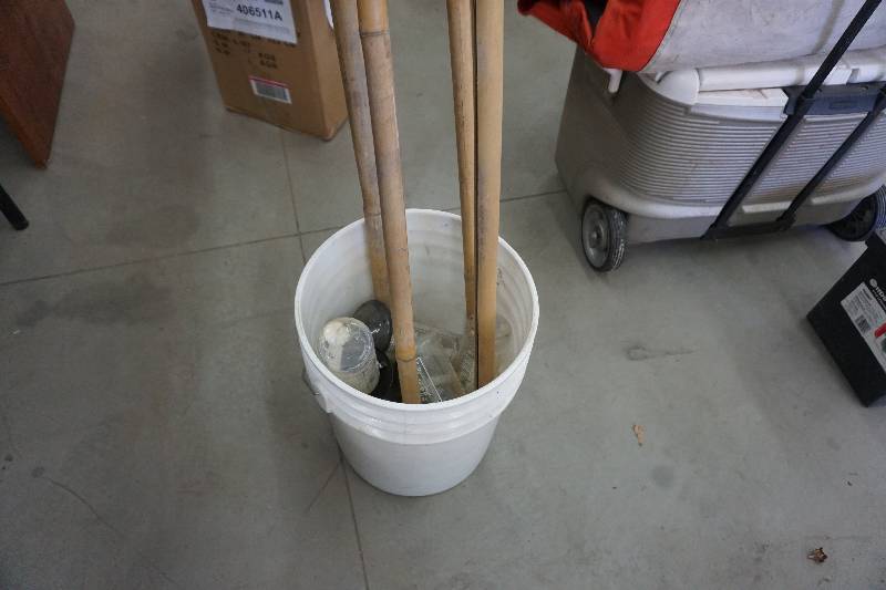 lot 20 image: 4 -  Tiki Torches and Assorted Oil