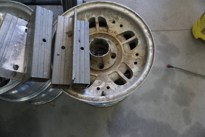 lot 23 image: Set of  - 4 Aluminum Rims Converted To Dock Base With Post Brackets