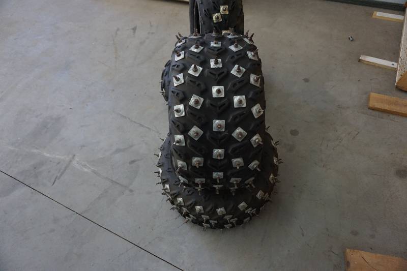 lot 16 image: Set of 4 Metal Studded Dunlop ATV Tires