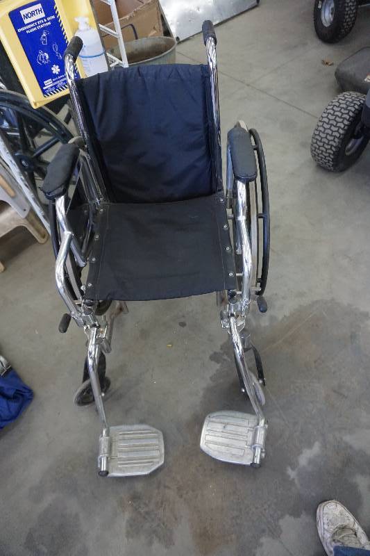 lot 22 image: Medline Brand Excel Narrow Light Weight Wheel Chair