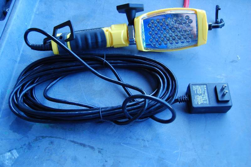 lot 23 image: 52 LED Hand-Held Work Light With Magnet Holder