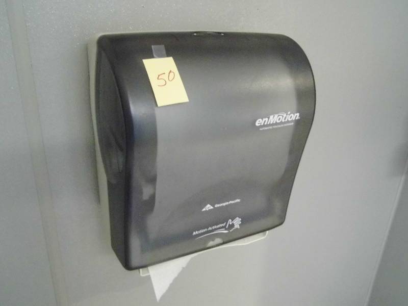 Motion Paper Towl Dispenser