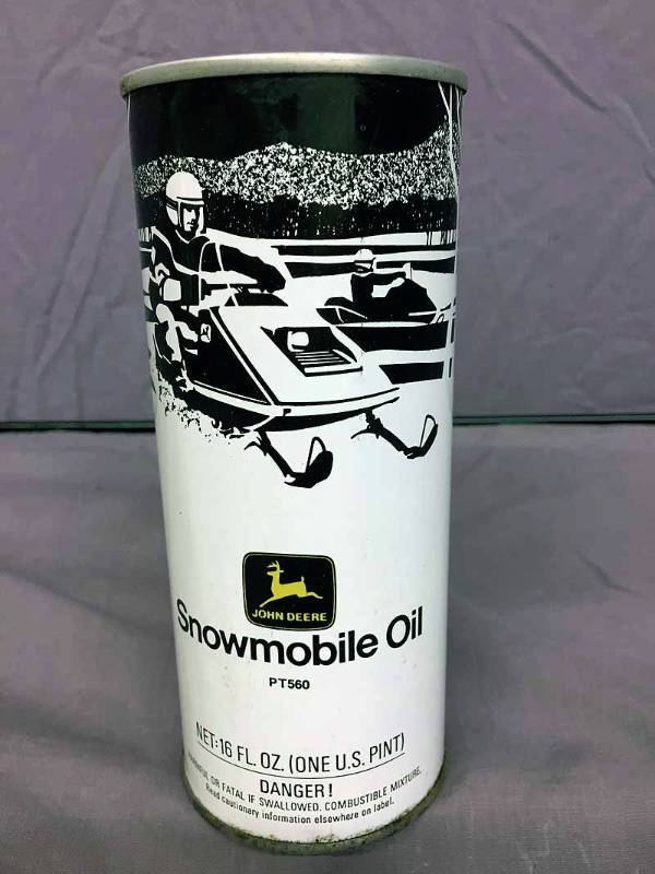 lot 65 image: John Deere Snowmobile Oil