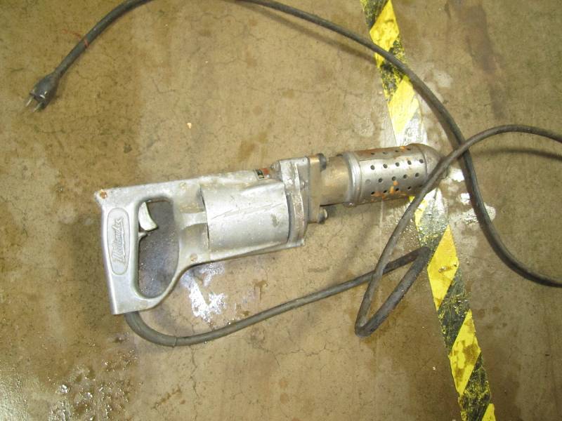 lot 24 image: Milwaukee electric hammer 34 inch...