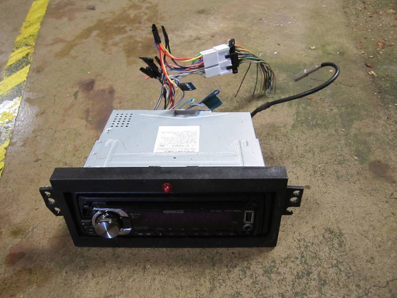 lot 27 image: Kenwood car stereo...