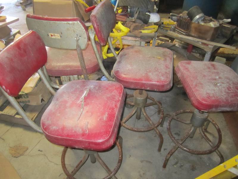 lot 50 image: 4 Vintage red office chairs...