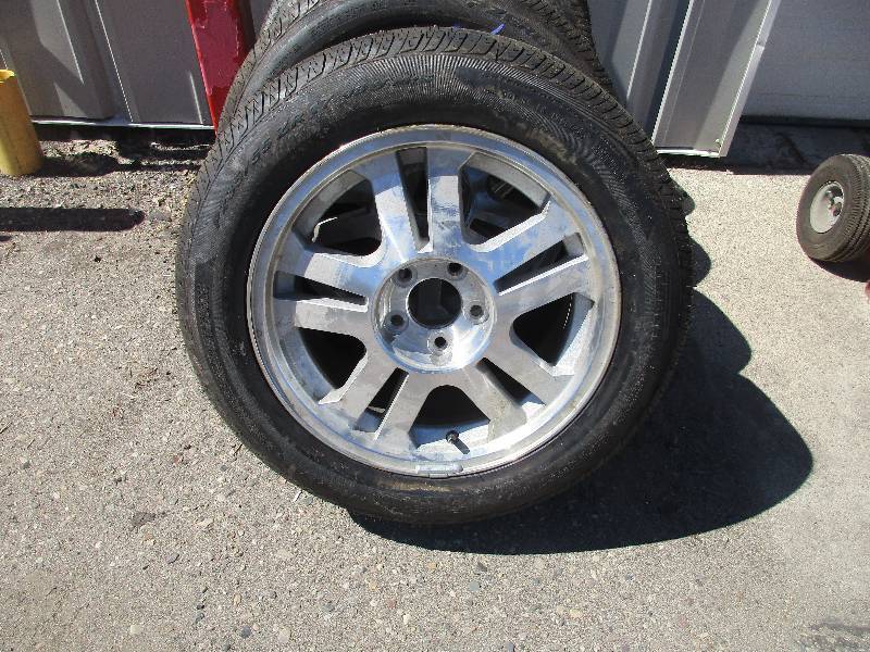 lot 9 image: Mustang rims & tires
