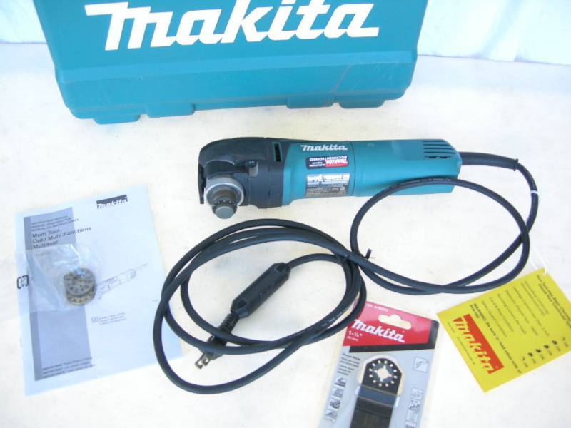 lot 42 image: Makita Multi-Tool Kit