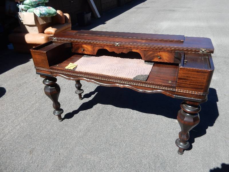 Piano Style desk with sliding desk top..