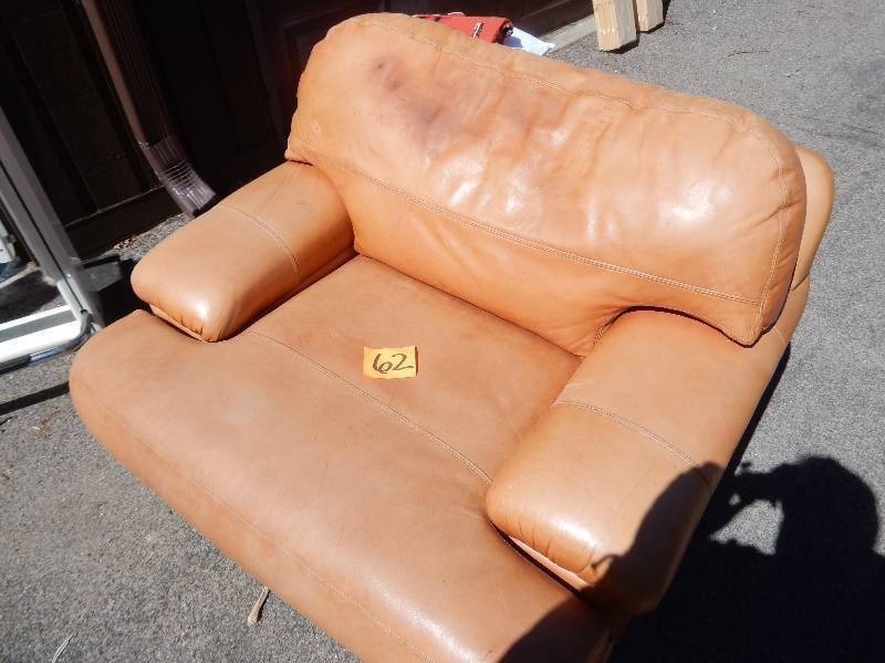 ALL LEATHER, very WIDE Chair.. Needs some work on the stains on the head rest, but other than that, very good shape