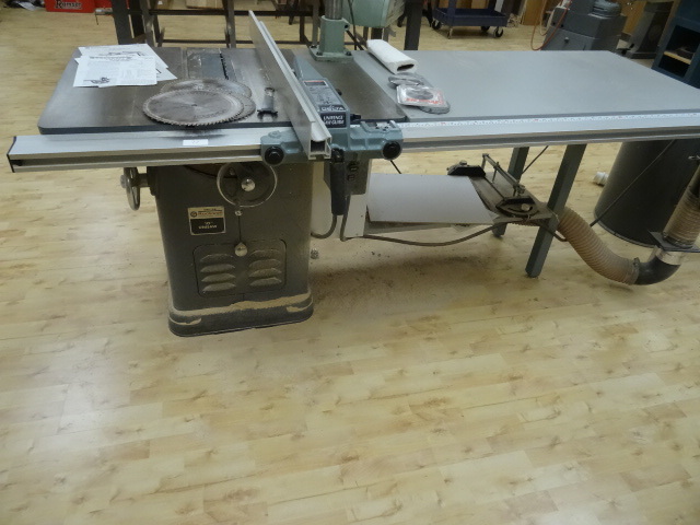 lot 27 image: Delta Rockwell 10 unisaw. Model 54...