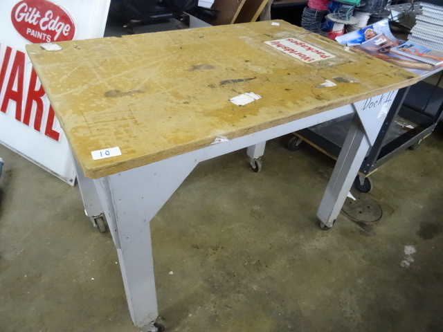 Wood table on wheels. 48 x 32 x 36...