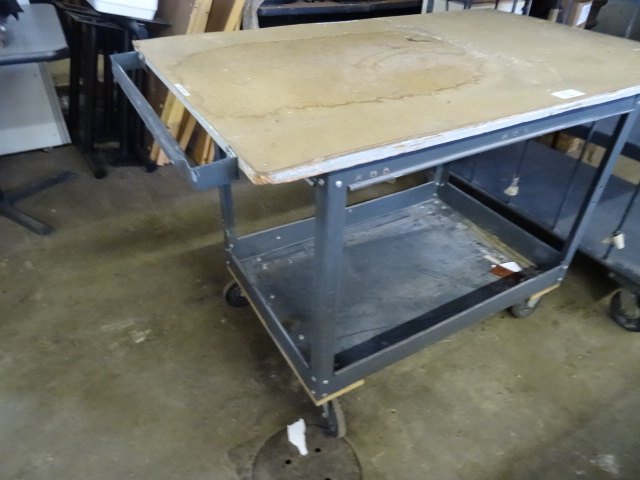4 wheel shop cart with wood top. 48...