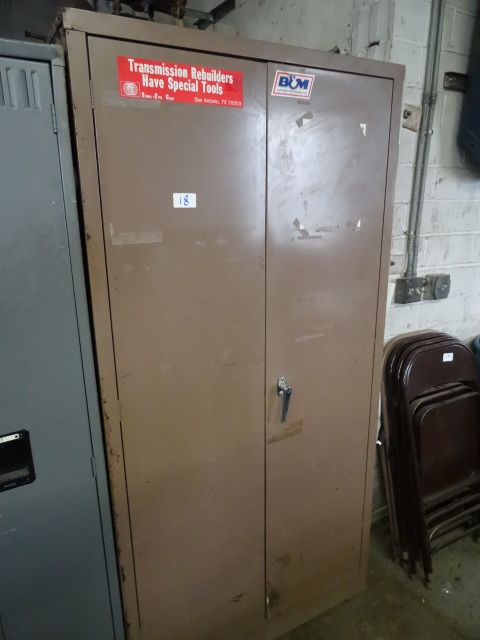 2 door metal cabinet. No shelves. 3...