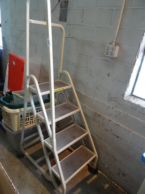 4 step rolling warehouse ladder...