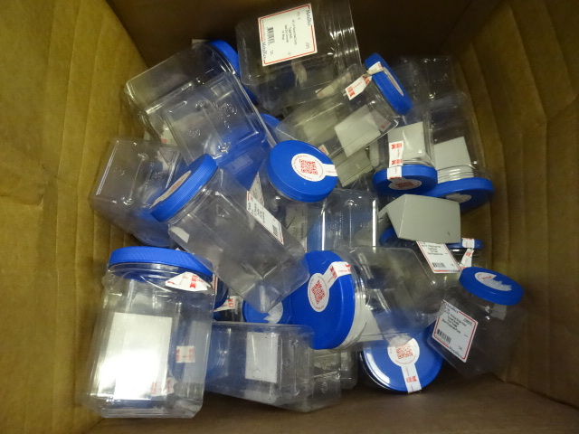 Misc plastic containers with lids. ...