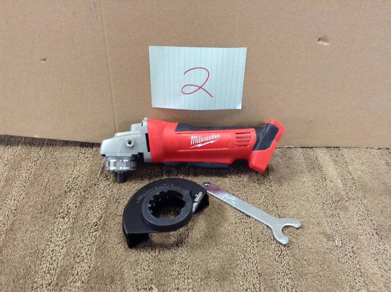 lot 2 image: Milwaukee M18 Cordless 4 12 Cut Off Grinder Tool Only - missing handle and hardware works like new