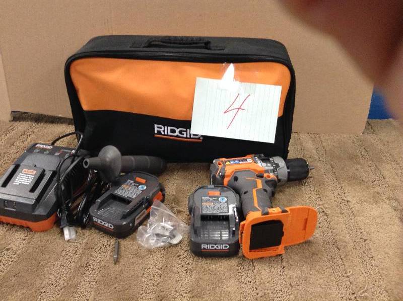 lot 4 image: Ridgid 18-Volt Lithium-Ion 12 in. Cordless Brushless Compact Hammer Drill Kit never used missing bolt that holds the handle