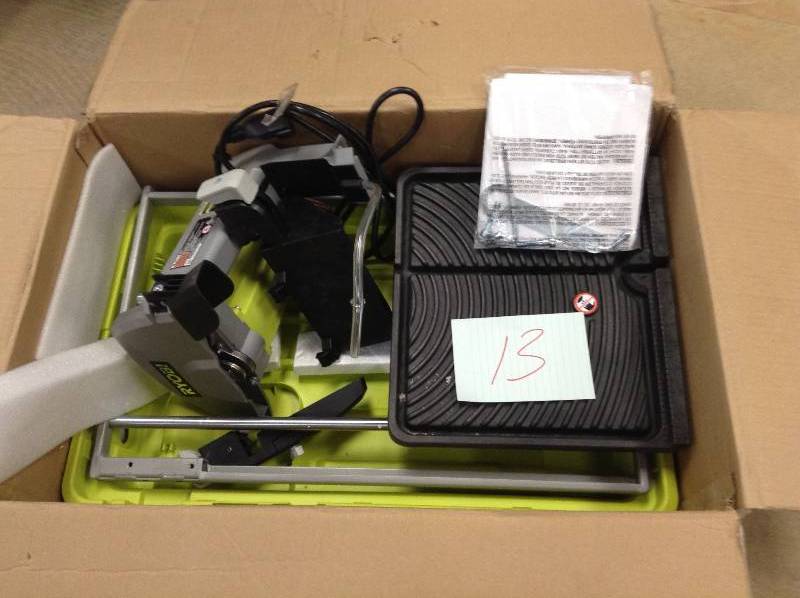 lot 13 image: Ryobi 7 Overhead Tile Saw missing water plug not used