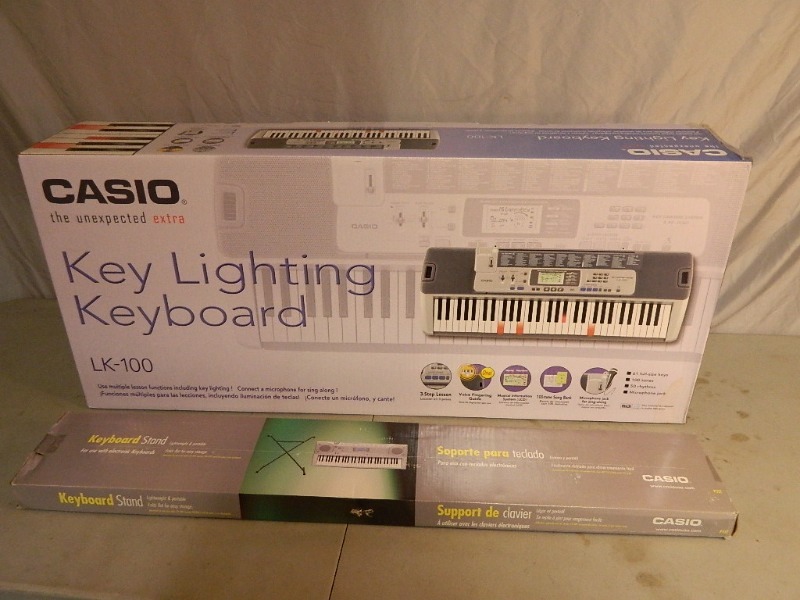 lot 68 image: New Casio Keyboard with New Stand
