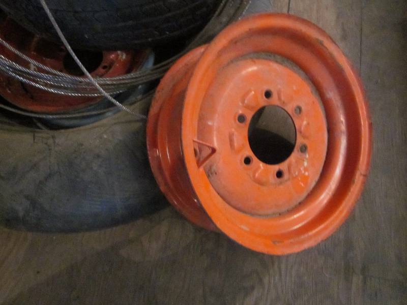 lot 214 image: 2 Rims, 2 Tires, Tube, & Cable