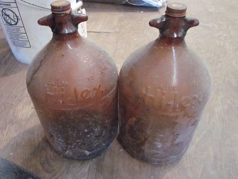 lot 233 image: Bike Planter & 2 collectible Glass Jugs