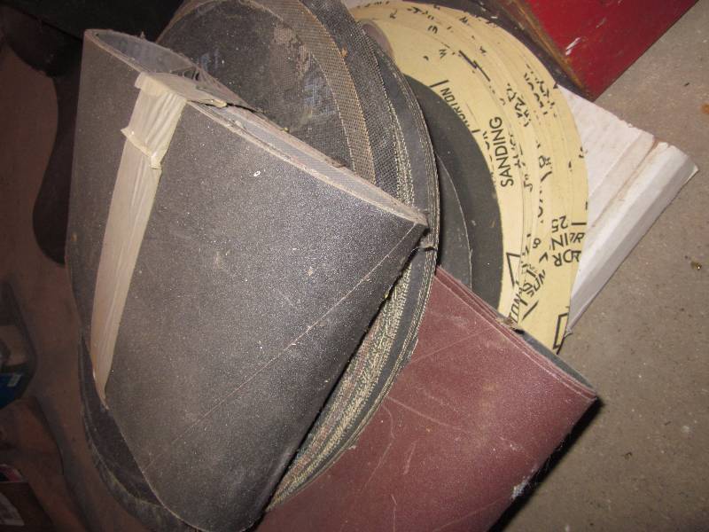 lot 142 image: Sanding Belts, Sanding Discs, Tool Box full of Items