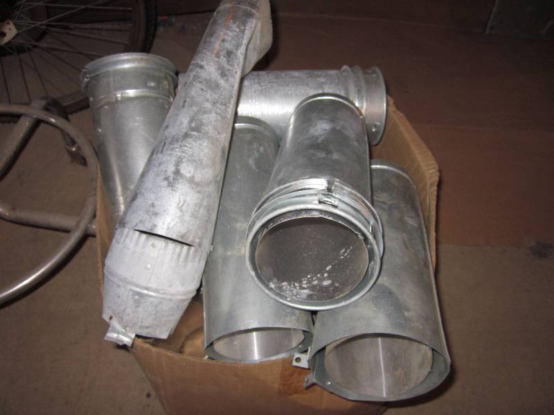 lot 269 image: Bike, Stove Pipe, Hand Planter, Ford Hub Caps, Stool, & Misc.