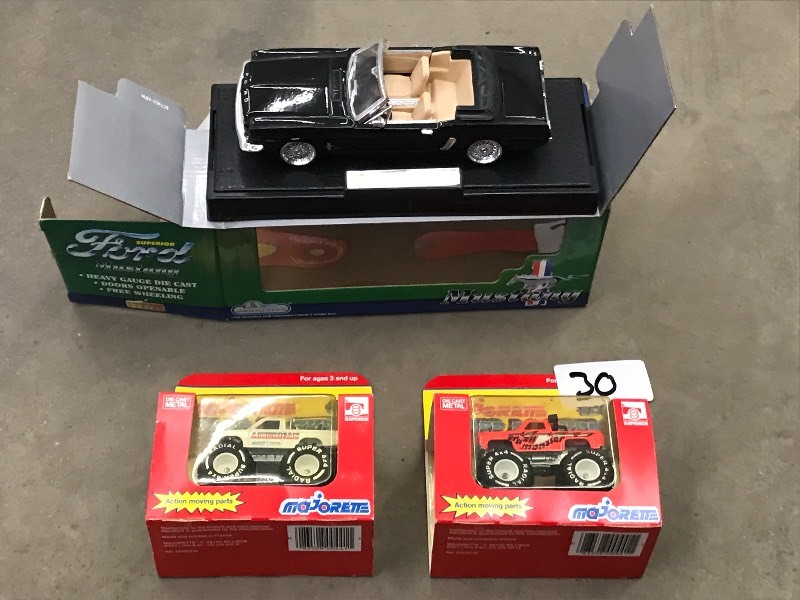 lot 30 image: Lot Of (2) Die Cast Metal Monster T...
