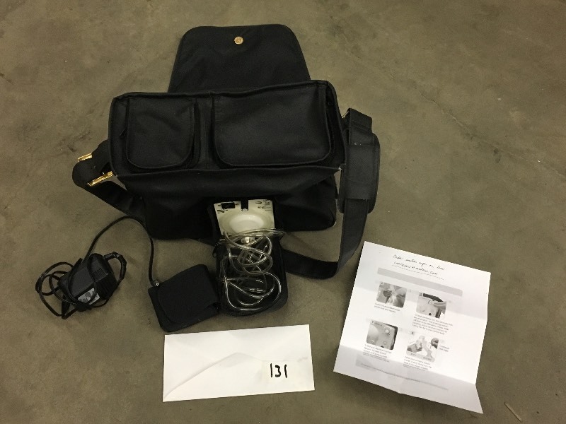 lot 131 image: Medella Powerd Breast Pump Set With...