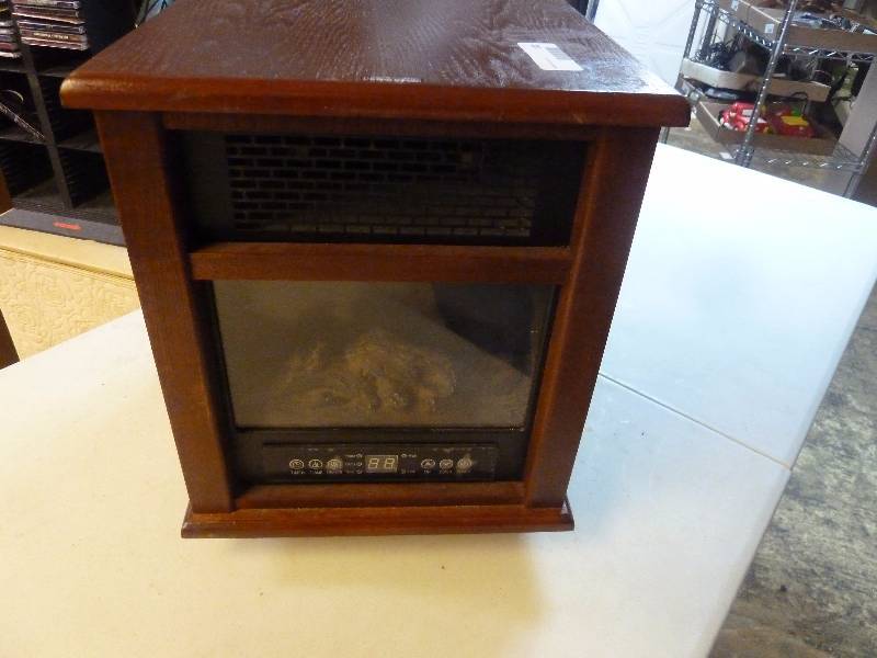 lot 122 image: small electric fireplace