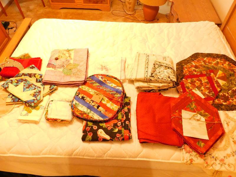lot 68 image: Lot of Tableclothes, Table Runners, Place Mats, and Hand Made Dioleys