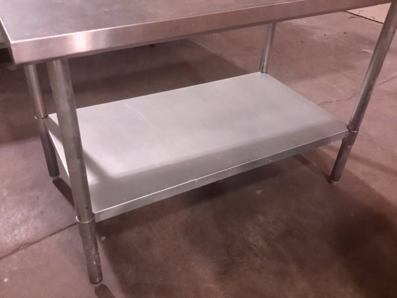 Stainless Steel work table with Shelf.. 48 in x 30 in x 33in..