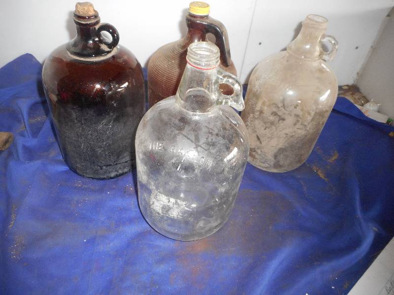 lot 24 image: 4 VINTAGE GLASS JUGS