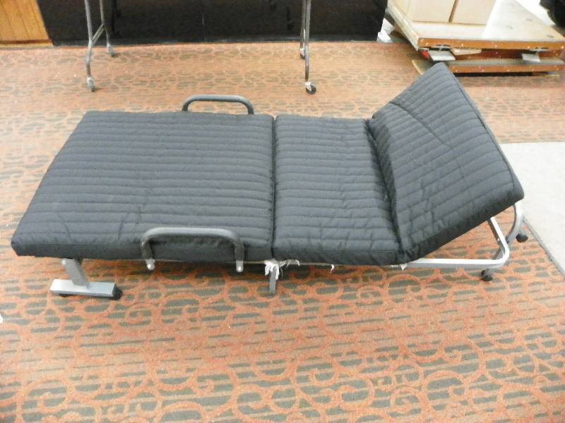 lot 575 image: Alcove Folding Rollaway BedSofa Black, MSRP $199.99