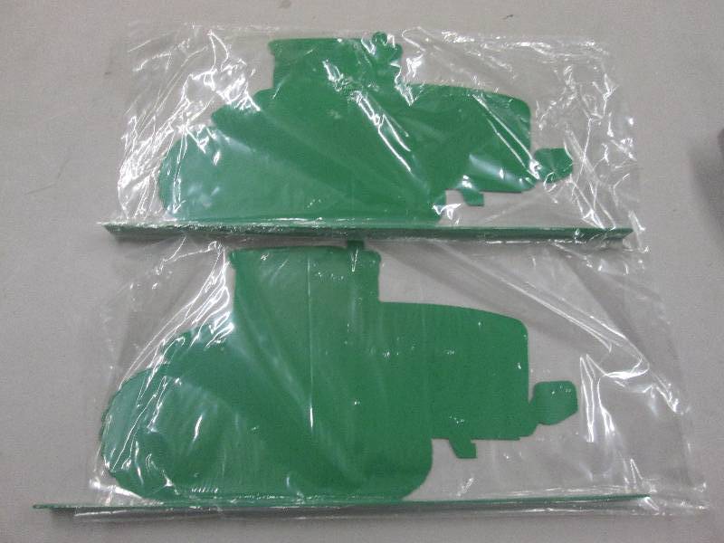 lot 255 image: Lot of 2 Green Metal Tractor Images...