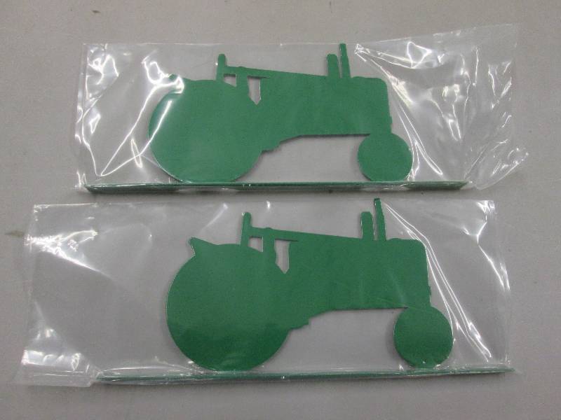 lot 257 image: Lot of 2 Green Metal Tractor Images...
