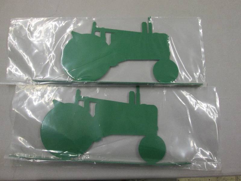 lot 259 image: Lot of 2 Green Metal Tractor Images...