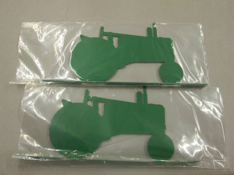 lot 260 image: Lot of 2 Green Metal Tractor Images...