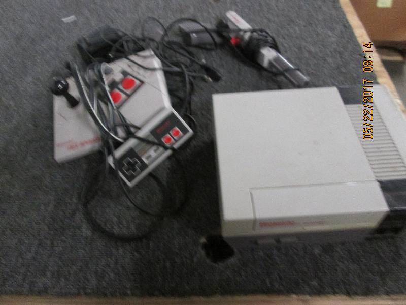 lot 65 image: nes system 2 controllers and a gun ...