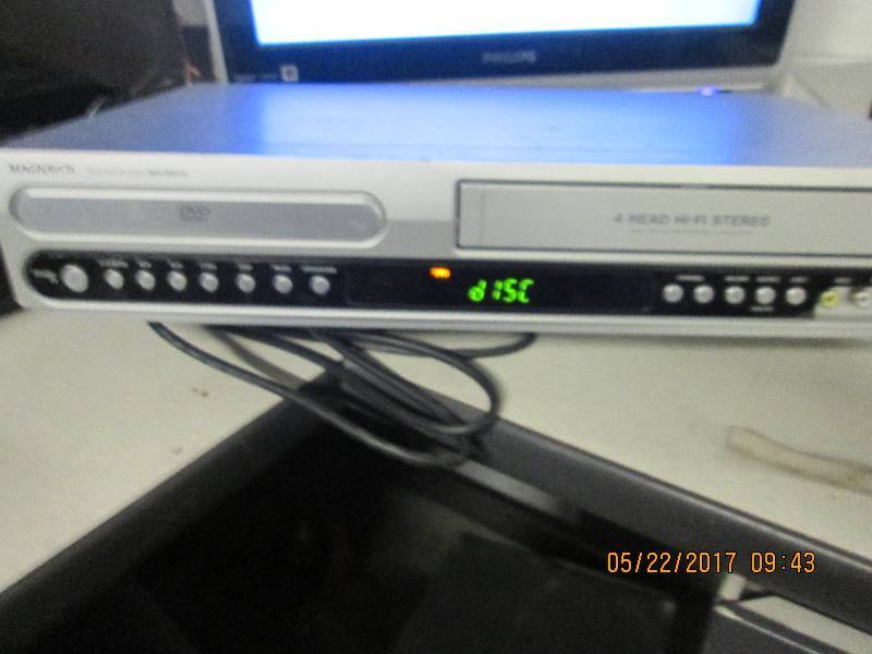 lot 76 image: magnavox dvdvhs player mdv560vr te...